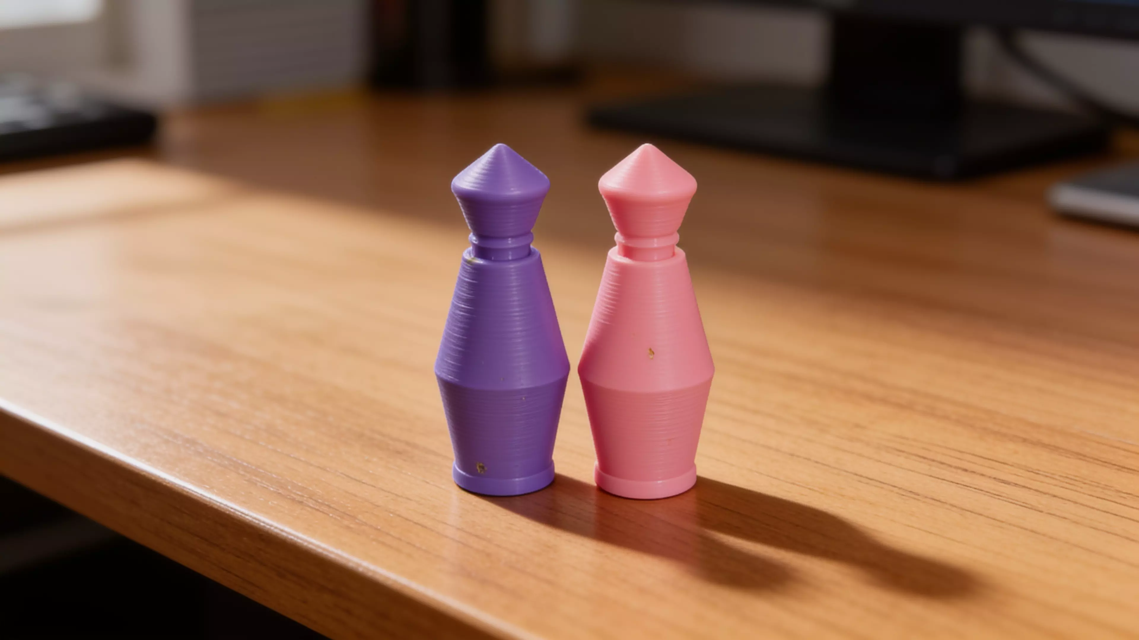 A pocket bowling toy: a lane tray that ramps into a flick-launch pad and doubles as nested storage, six molded pins in a 3-2-1 triangle, and one flick disc — flick the disc off the ramp to send it down the lane into the pins.