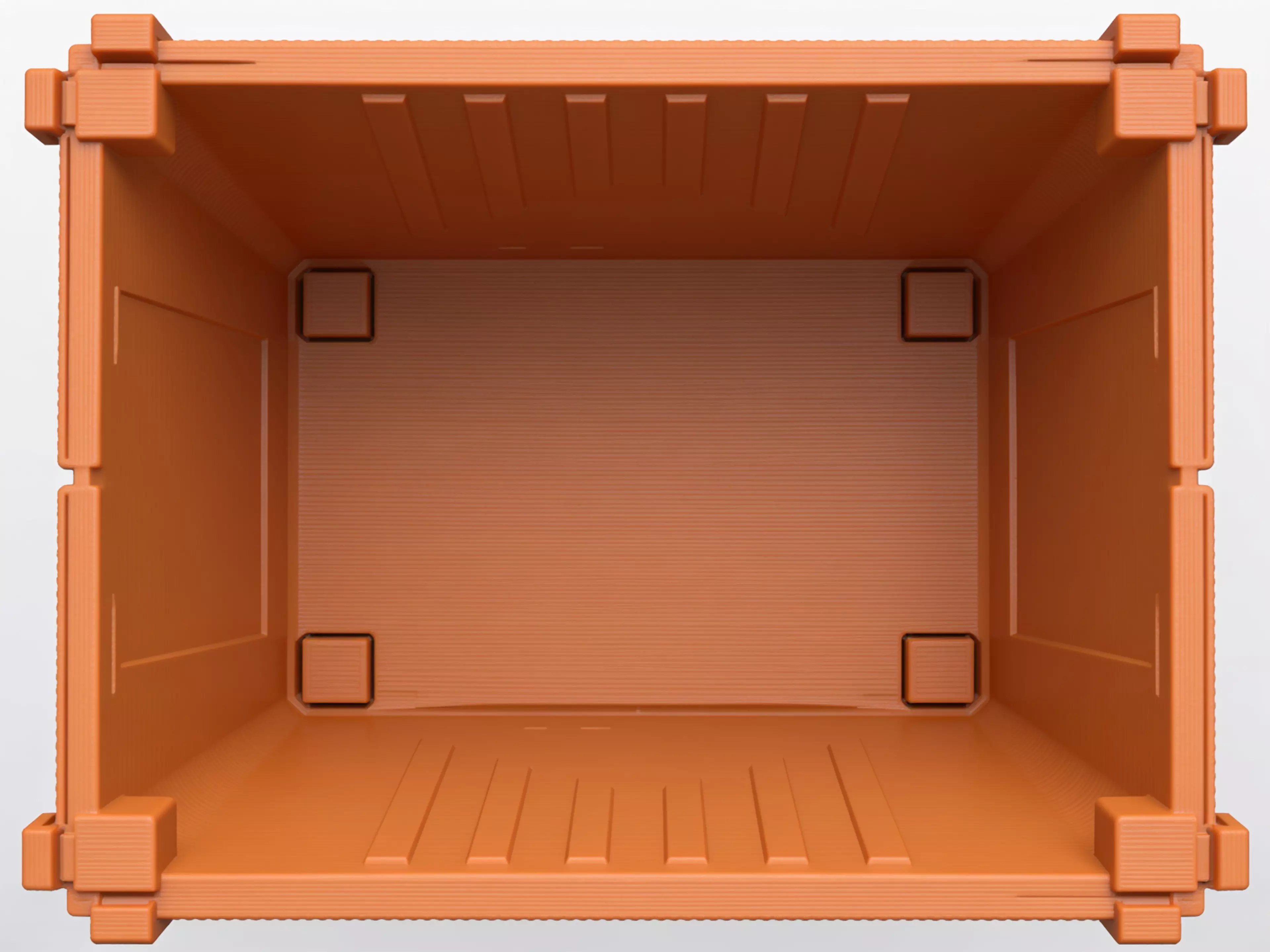 A miniature industrial-dumpster-styled desk trash catcher: a tapered corrugated bin body with two hinged flip lids that meet in the middle, complete with corner skid feet.