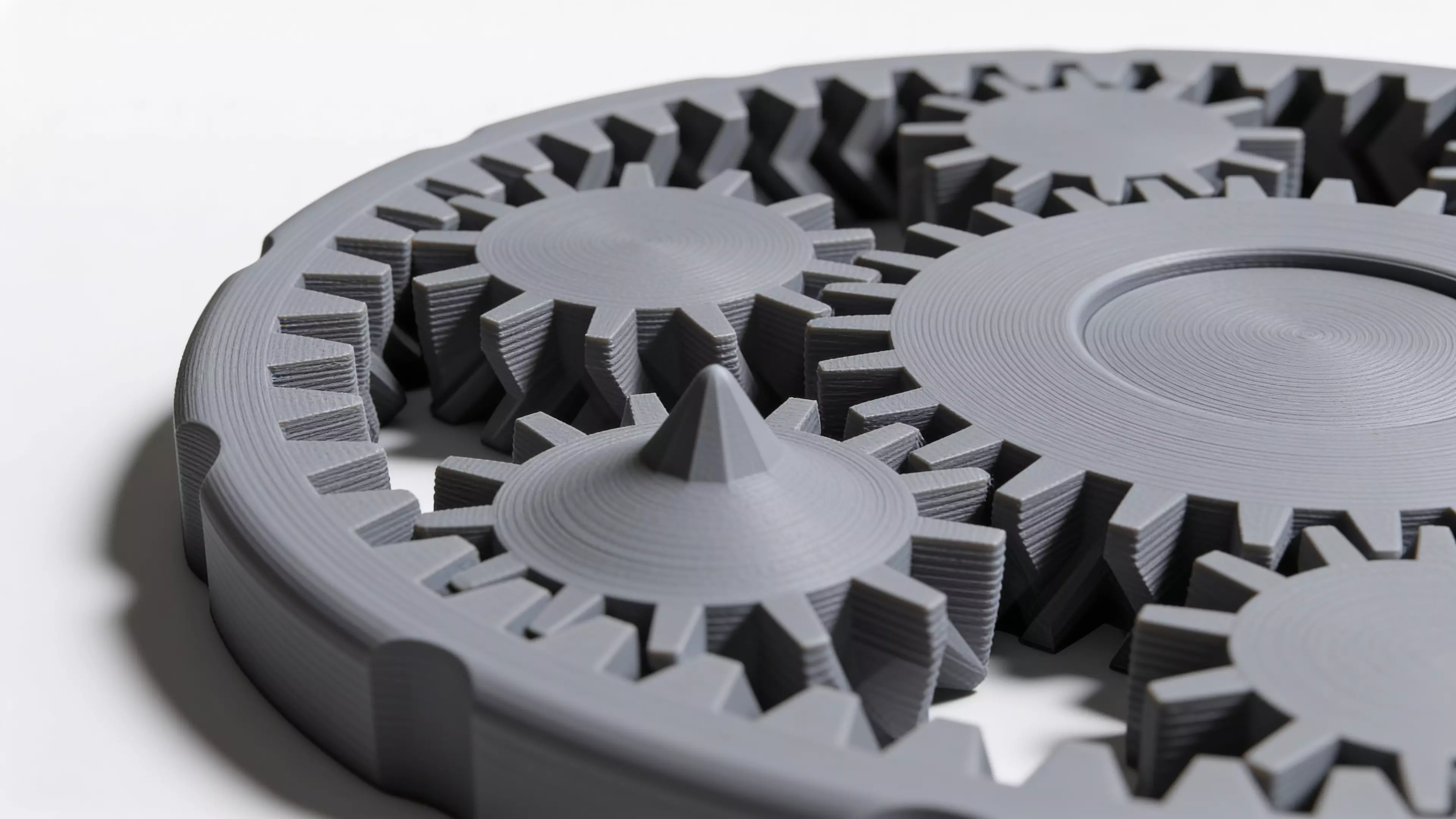 A 3D-printable fidget spinner planetary gear system.