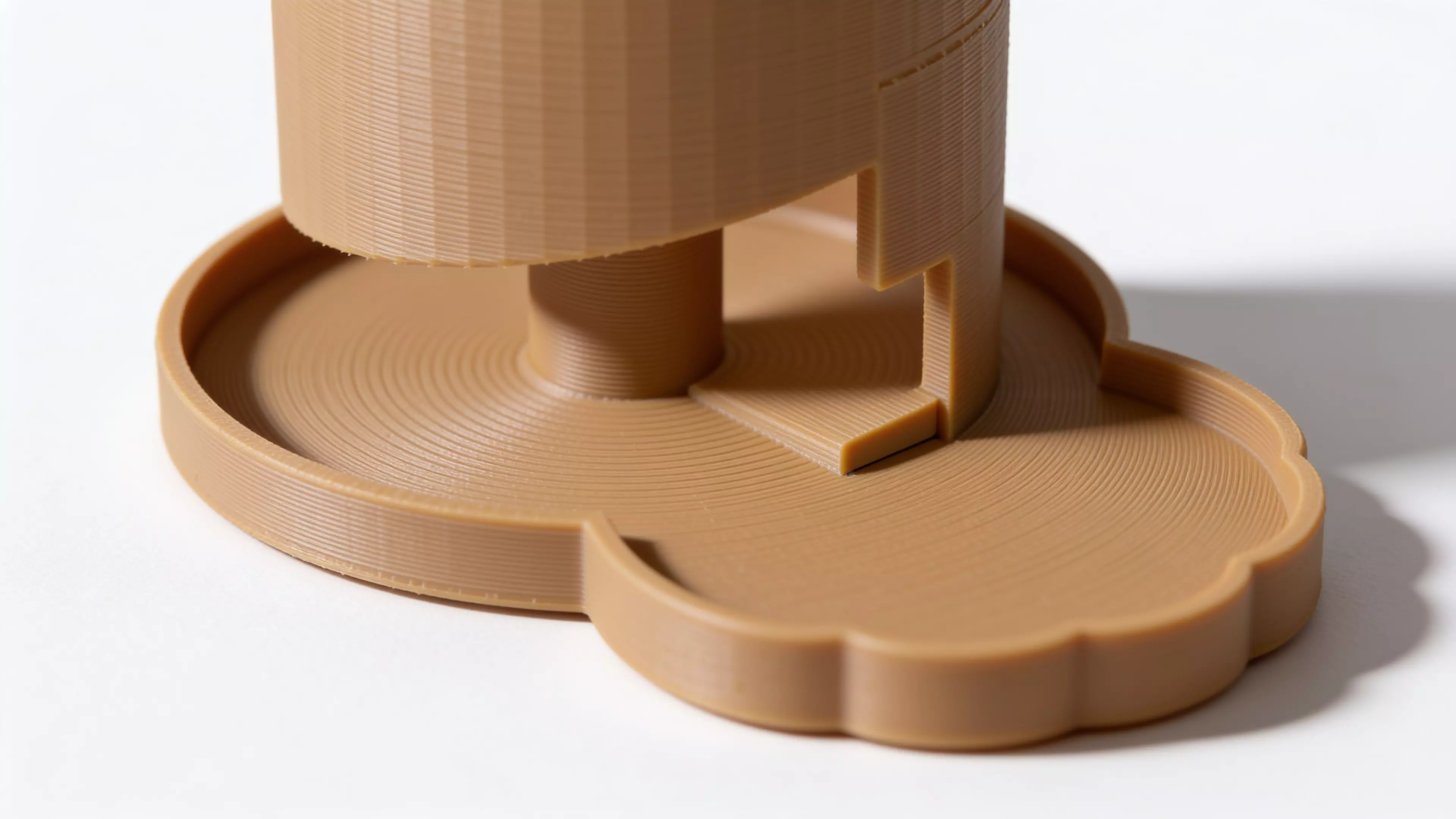 A 210 mm tall helical dice tower: a funnel hopper feeds dice onto a spiral ramp that winds 2.42 turns around a central pillar, contained by overlapping guide walls, exiting through a domed chute near the base onto an integrated landing tab.