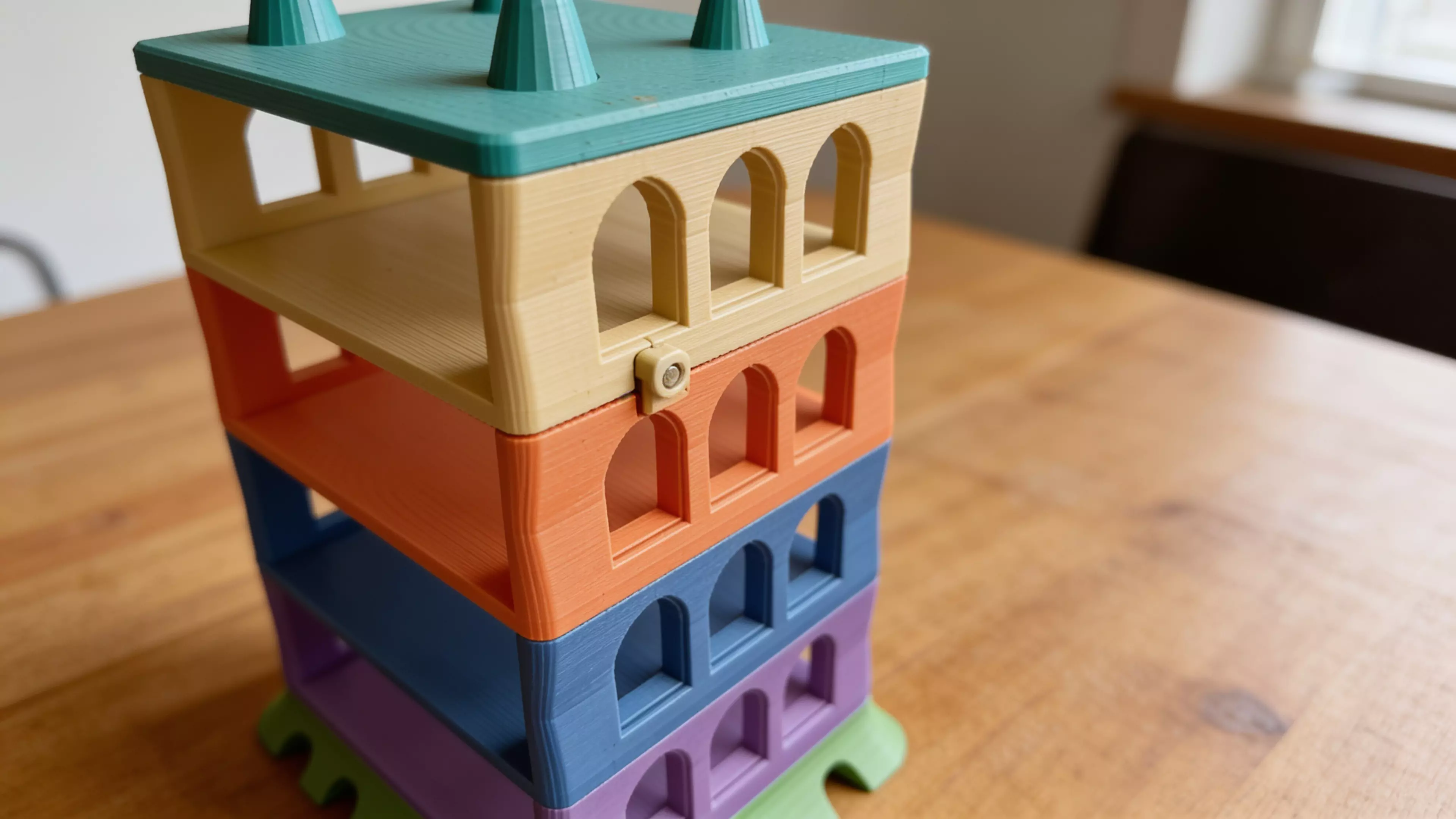 A freestanding 6-piece sculptural tower — splayed organic plinth, four identical catenary-arch bay modules that each cradle one DGX Spark on an open slide-in shelf, and a four-pinnacle parabolic crown — in matte bone-tone PLA, 210 × 170 × 309 mm assembled.