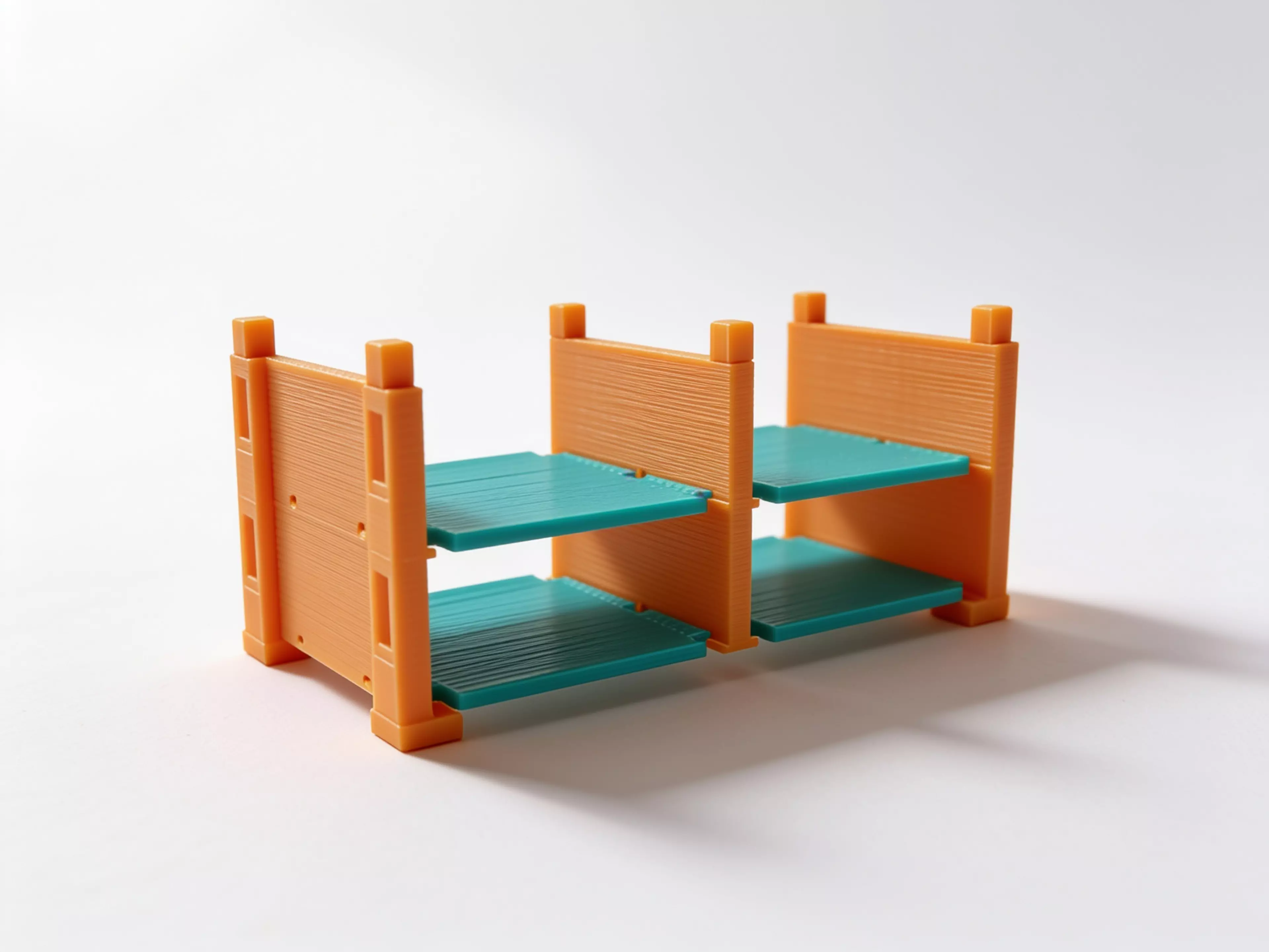 A PETG FDM knock-down rack holding 2 NVIDIA DGX Spark per tier (2 tiers = 4 devices), built from zero tier-unique parts — 2 end walls + 1 center divider + 2 floor trays per tier, stacked on 8 x 8 mm self-locating chamfered key joints, with 4 press-fit feet and flush top caps, styled as a…