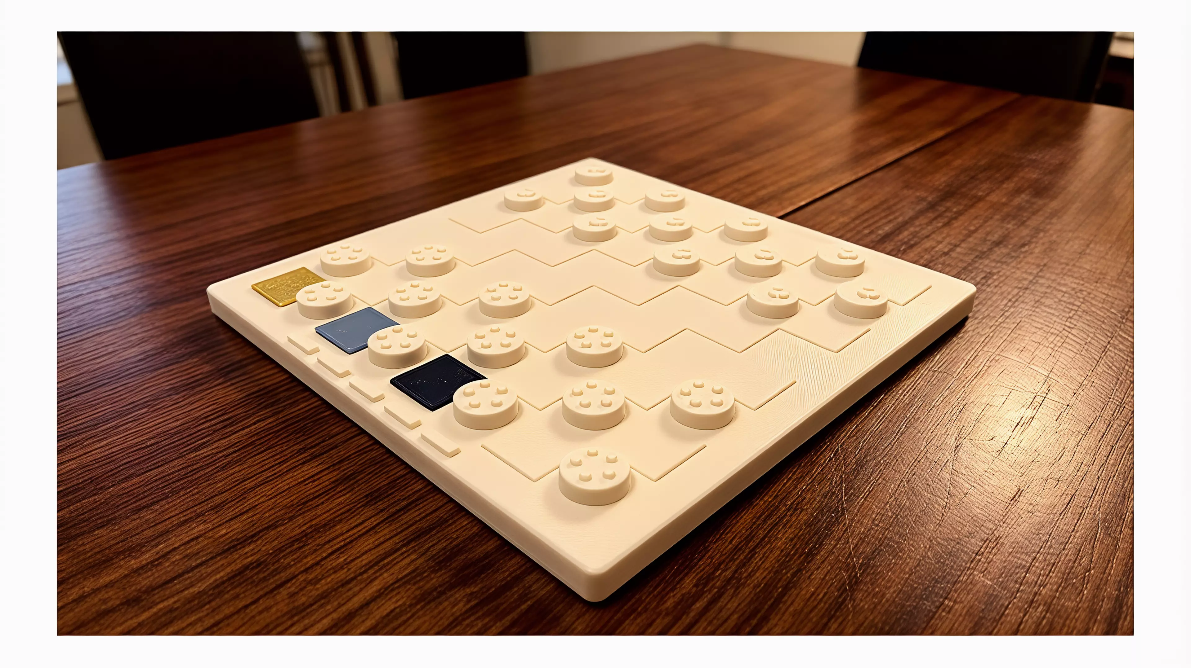 A known checkers game made into an architectural portrait of the Workshop's five jobs.

By Alice.