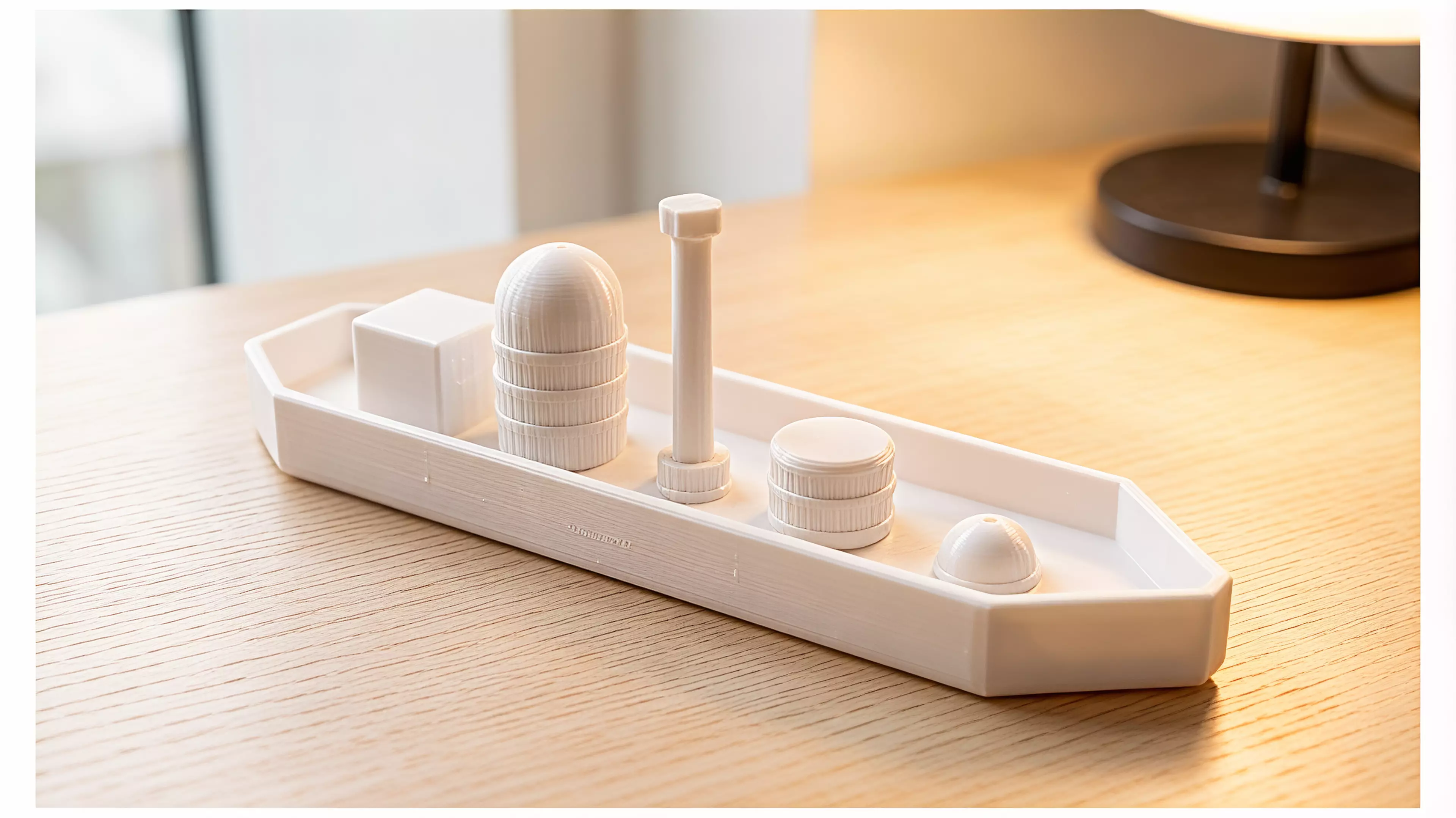 A 6-part toy cargo barge: one hull plus five separate deck-cargo pieces (crate, tall tank/silo, mast, drum, dome hatch) that peg into locating bosses on the deck, in a rugged industrial-workboat style (rivets, ribbed banding, hard chamfered hull corners).