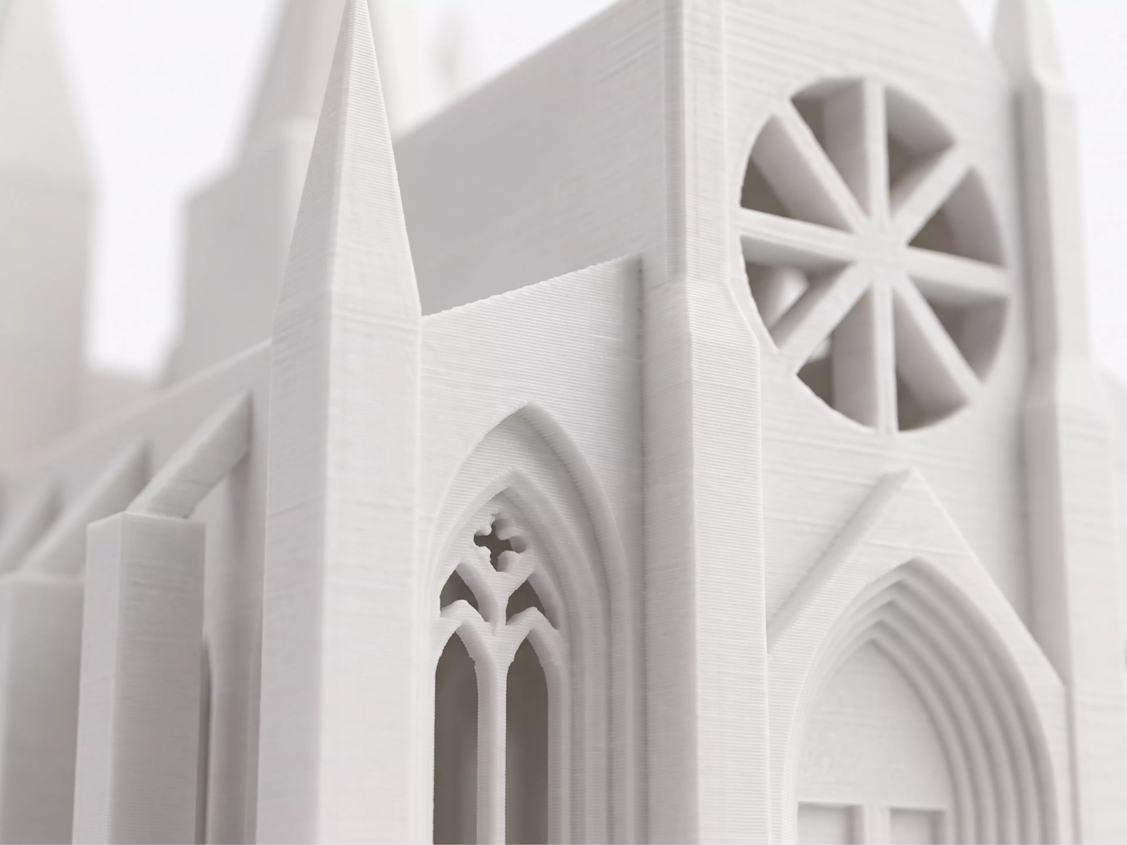 The Calibration Cathedral is a Gothic micro-cathedral that is secretly a complete FDM torture test: self-supporting pointed-arch windows, a graduated flying-buttress overhang staircase, tapered spires and pinnacles for bed adhesion and fine detail, a bridging rose window, a print-in-place captured…