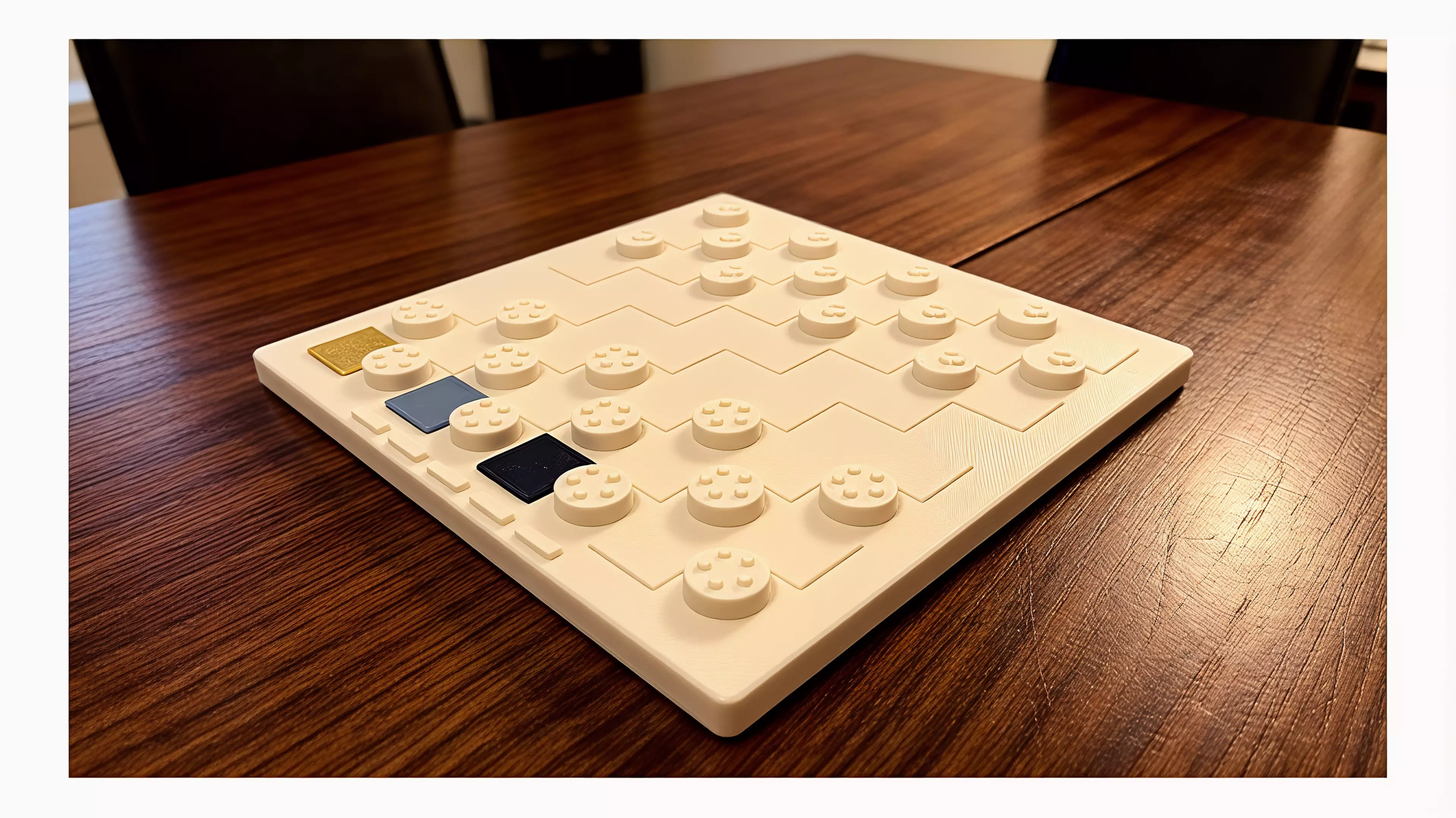 A known checkers game made into an architectural portrait of the Workshop's five jobs.

By Alice.