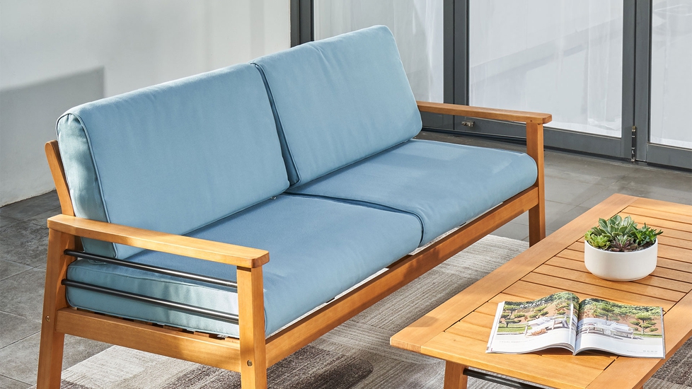 Work comfortably in back yard with the wooden outdoor sofa by Vifah.
