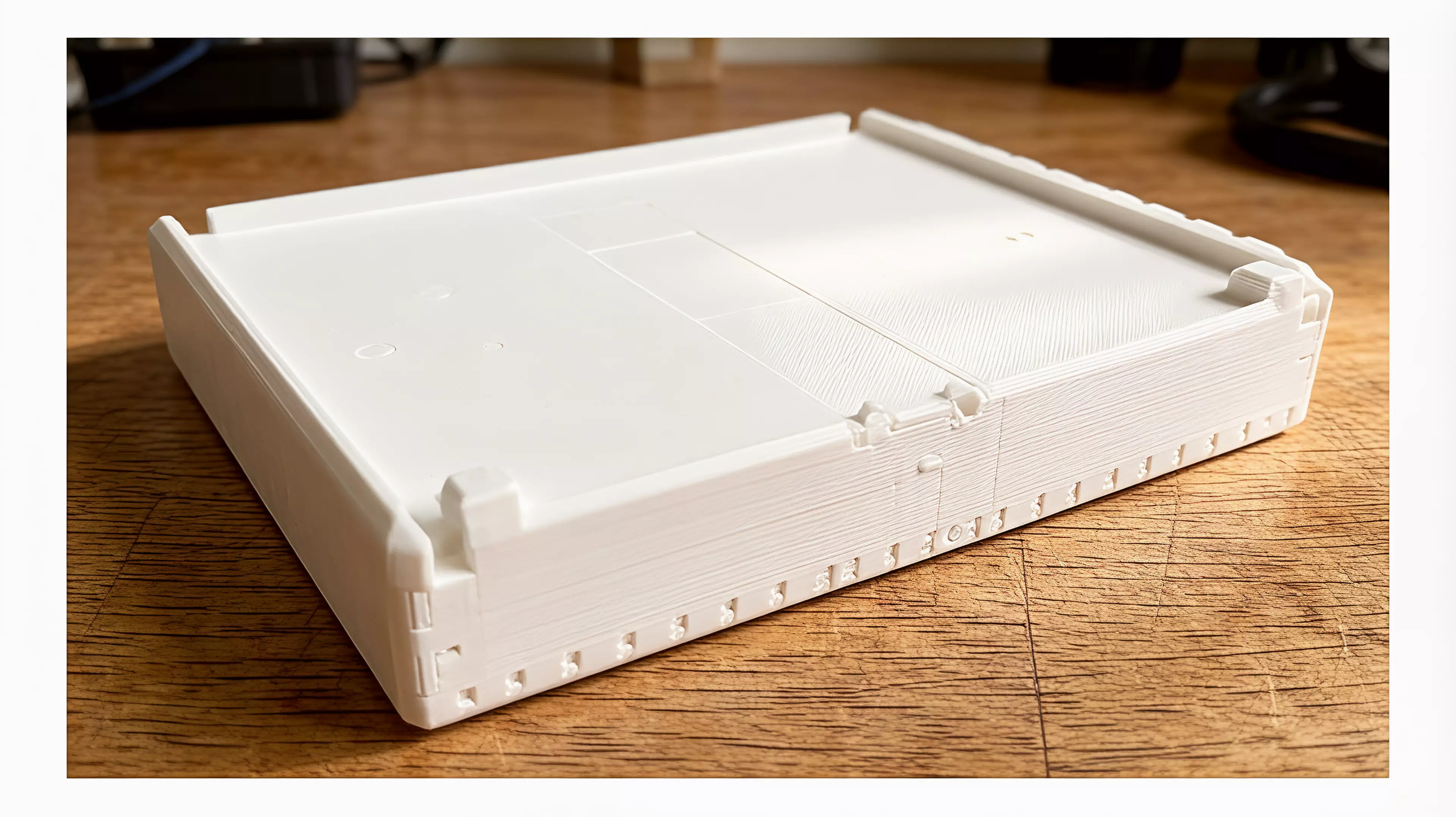 A modular rack tier for two NVIDIA DGX Spark nodes side-by-side, built as left + right halves tied by a slide-in dovetail plate, with male dovetail rails on top and female slots underneath so identical tiers slide-stack from the rear and lock with rear thumb-screw stop keys — in the chosen soft…