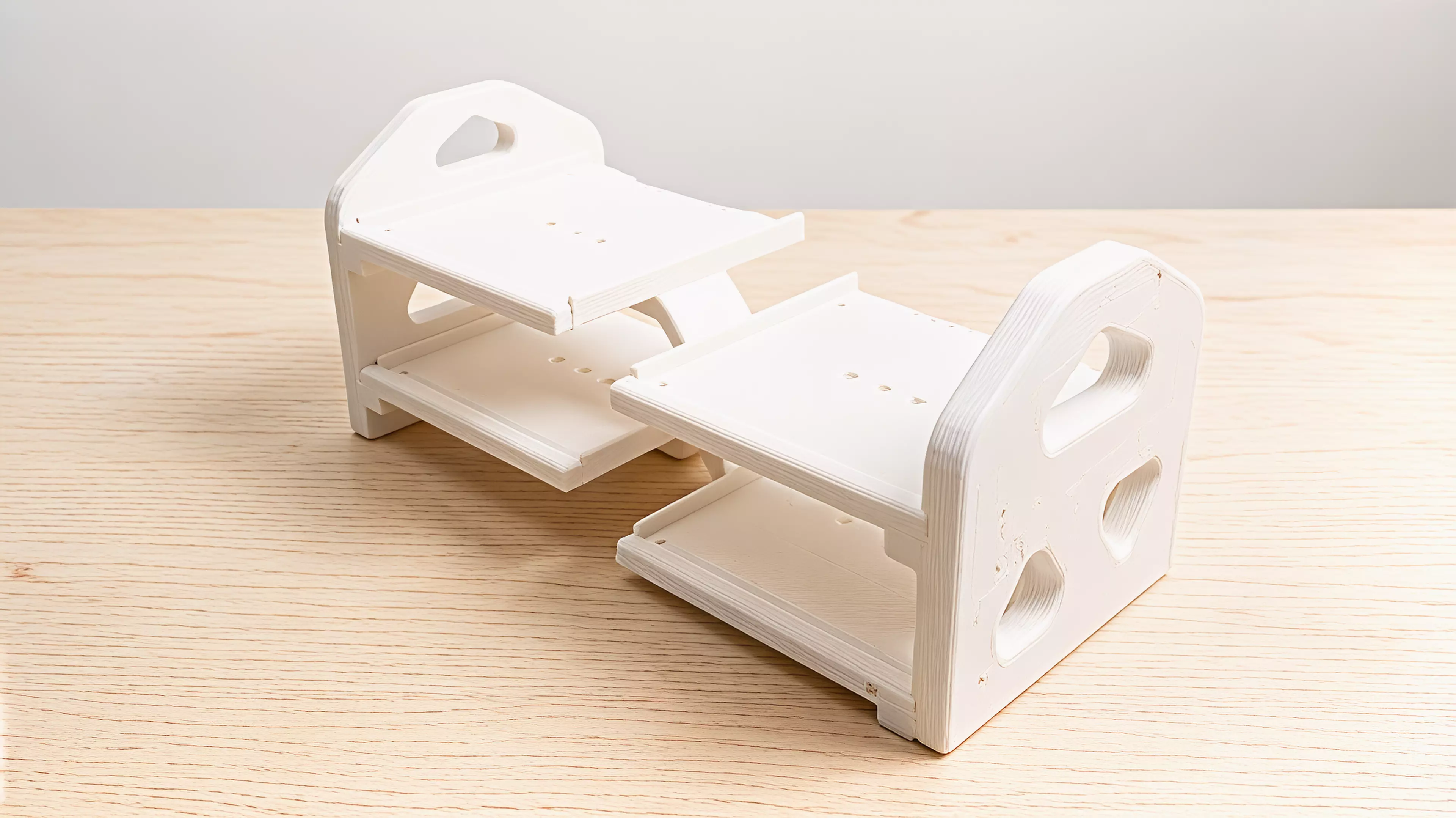 ** a 7-part, screw-together FDM display rack (365 × 160 × 151 mm assembled) holding 4 DGX Spark nodes (150 × 150 × 50.5 mm) in a 2×2 cascade — 35 mm horizontal / 20 mm vertical stagger — fully open front and back, in the chosen soft-wave hi-fi style.
