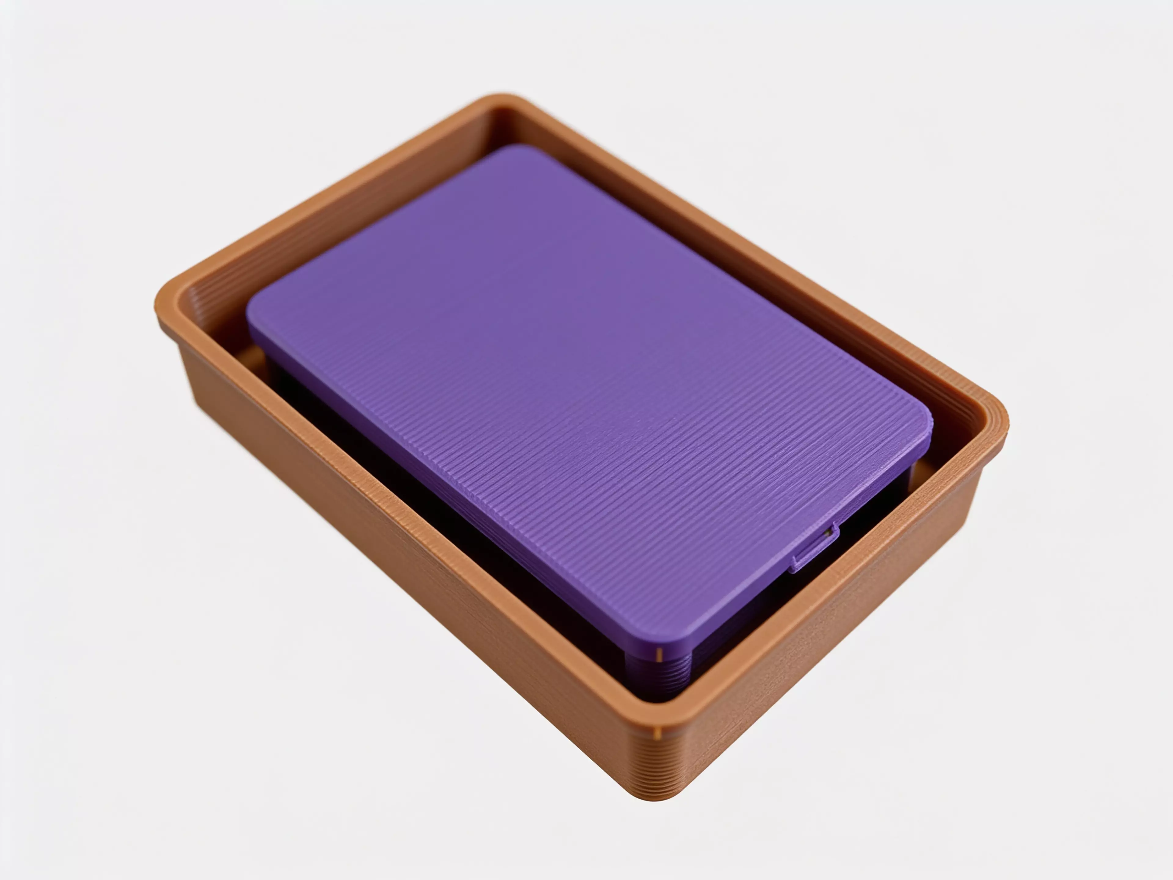 A complete Double-6 domino set — 28 tiles (48 x 24 x 8 mm) with raised embossed pips — stored in a fitted two-row tray with a slip-fit lid.