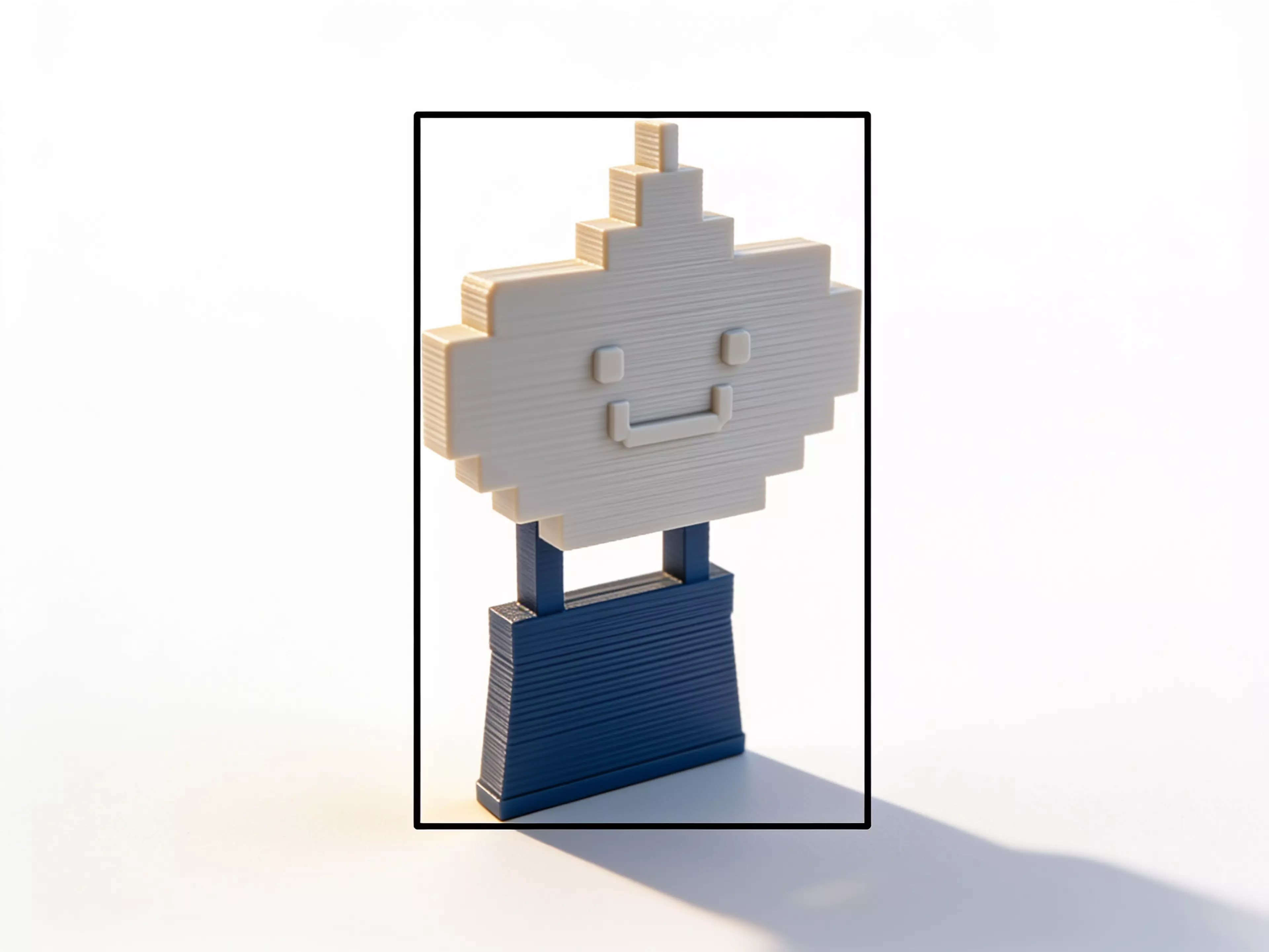 A two-part printable cupcake whose lifted frosting transforms its wall shadow into a hot-air balloon.