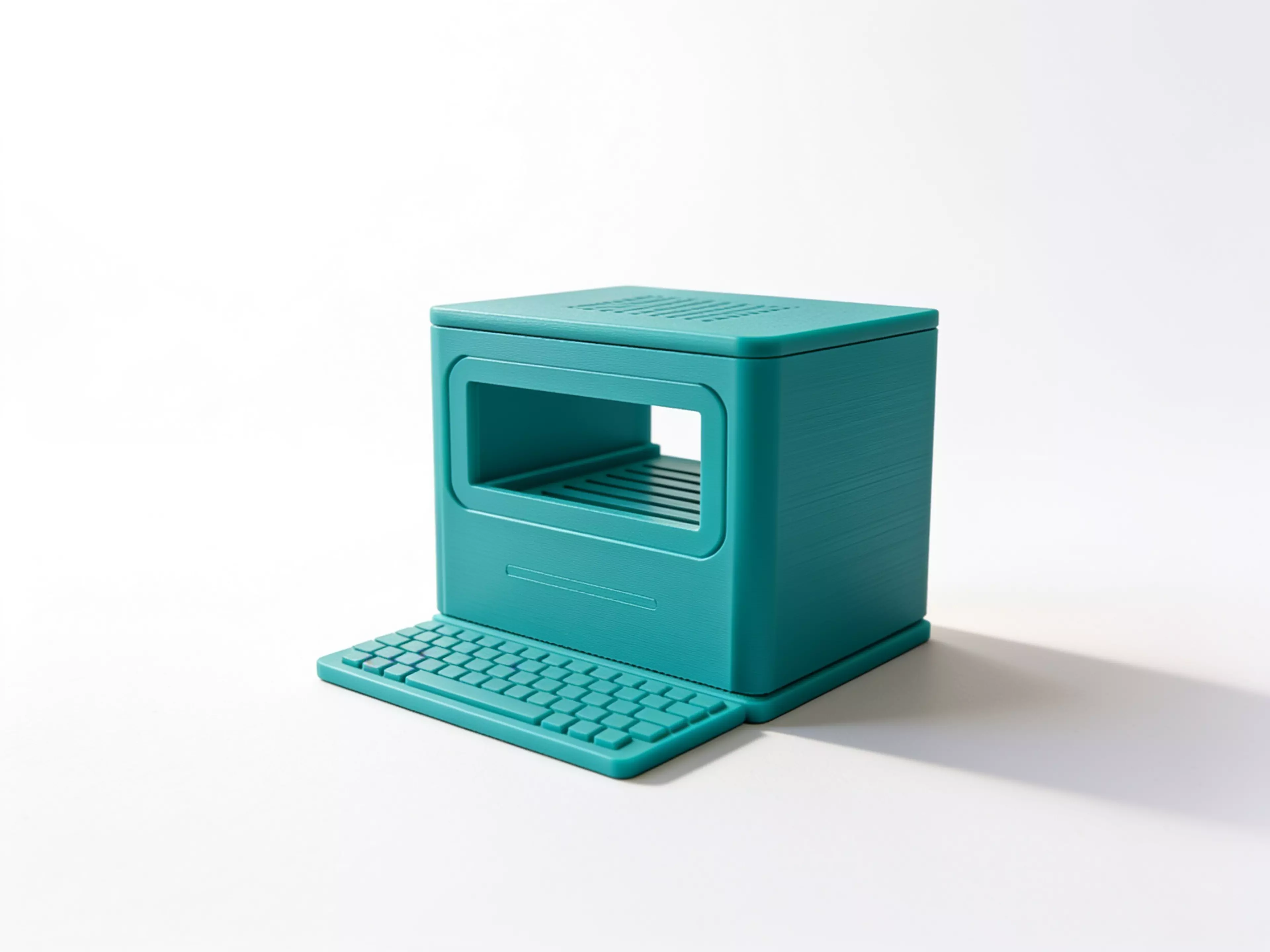 a 220 × 180 × 178 mm Macintosh-silhouette desktop shelf in crisp modern-minimal style, with an open front-to-rear tunnel that holds one NVIDIA DGX Spark (150 × 150 × 50.5 mm) on two internal rails, built as a main body + removable top cover + detachable base plus secondary trim parts.