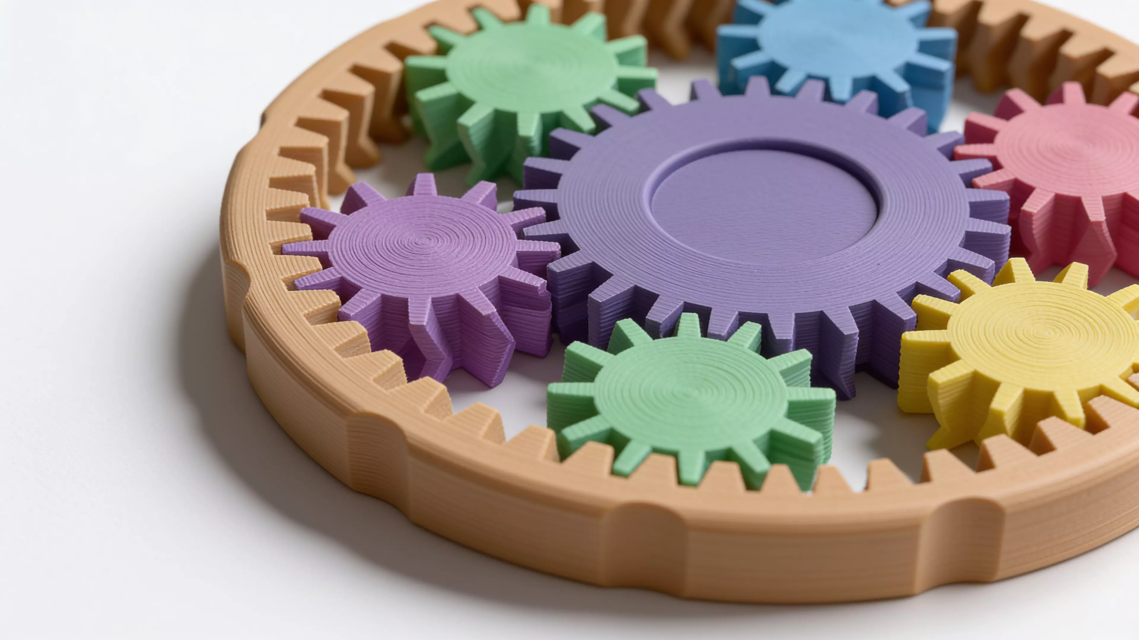 A 3D-printable fidget spinner planetary gear system.