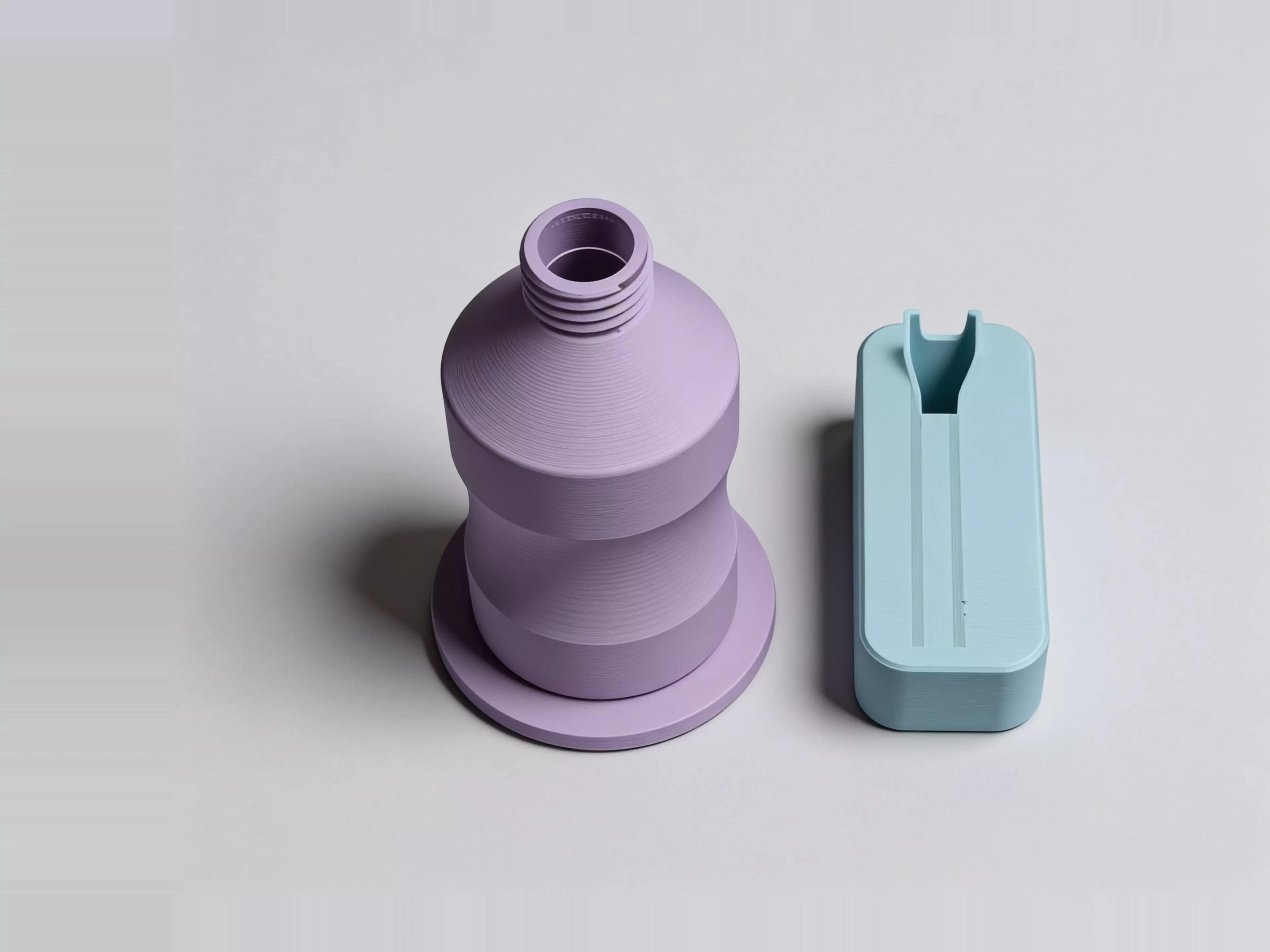 Stop juggling your water bottle and phone during workouts.
📱 PHONE STAND CAP
Screw-on lid doubles as a secure phone holder with a self-adjusting wedge slot (fits 70-90mm wide phones with case). Landscape orientation perfect for watching exercise tutorials, timers, or music playlists.

💧 500ML HYDRATION
Generous capacity for full gym sessions. PETG construction is durable, lightweight, and easy to clean. Built-in drainage holes in the phone slot keep moisture away from your device.

🏋️ GYM-READY DESIGN
Stable base prevents tipping even when empty. Compact enough for any bench, desk, or floor mat. The angled phone position keeps your screen visible at eye level without straining your neck.

Perfect for: Home gym enthusiasts, personal trainers, CrossFit athletes, yoga practitioners, anyone who follows video workouts.