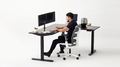 image of l-shaped desk with model - Autonomous.ai
