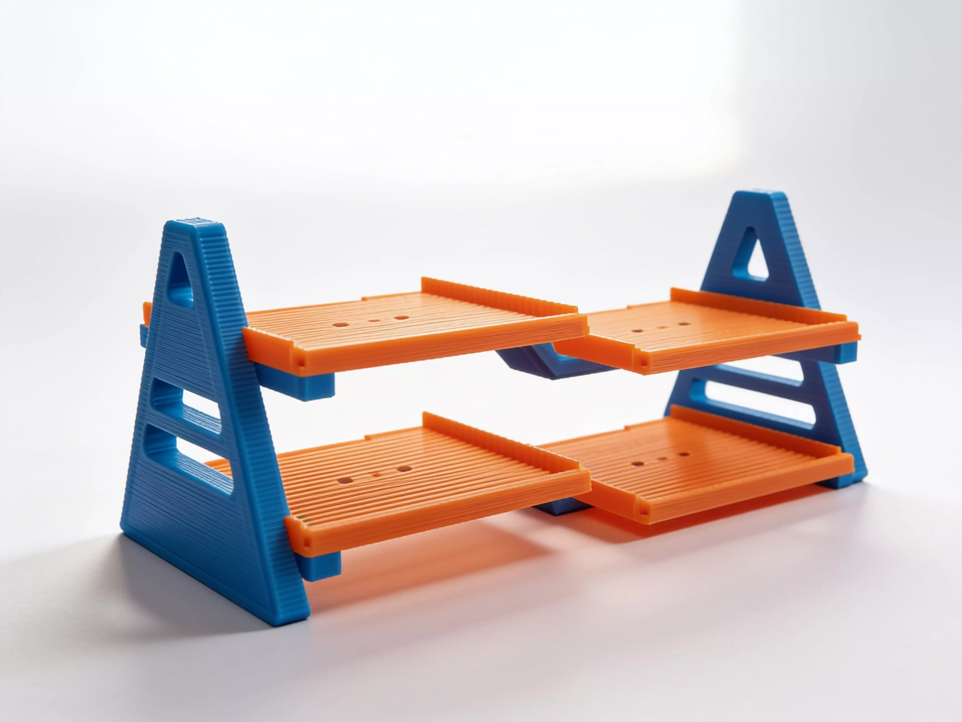** a 7-part, screw-together FDM display rack (365 × 160 × 151 mm assembled) holding 4 DGX Spark nodes (150 × 150 × 50.5 mm) in a 2×2 cascade — 35 mm horizontal / 20 mm vertical stagger — fully open front and back, in the chosen soft-wave hi-fi style.