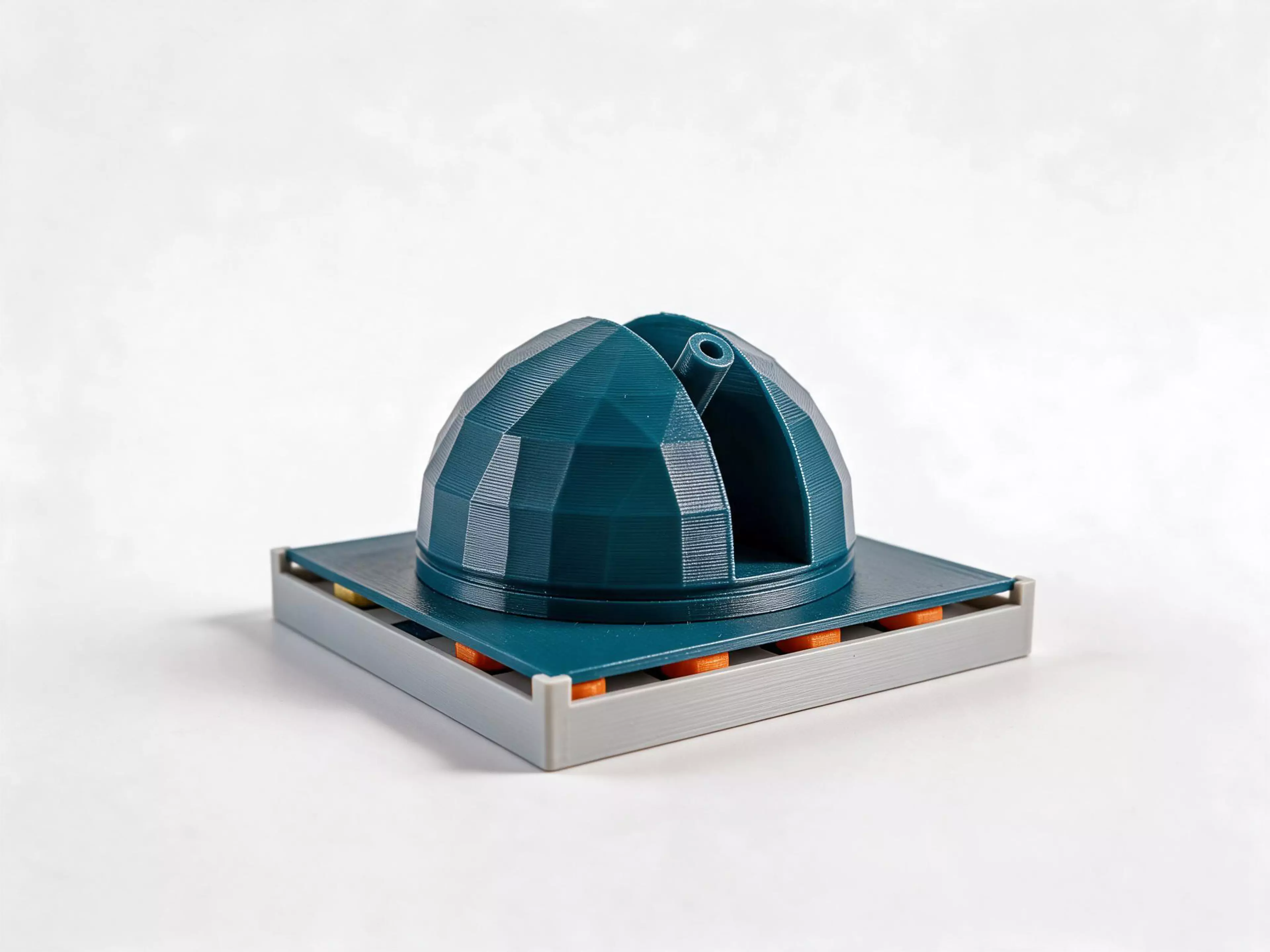 Lift a domed observatory roof off the box and the game is underneath. The dome's shutter is open the whole height of the dome, from the observatory floor over the apex and down the far flank, and a long telescope stands on that floor on its own footing and lies across the opening, most of its length visible down the slit with only its mouth clearing the shell. Under the roof is English draughts between the Sun and the Moon, on a chequerboard whose dark squares are inlaid tiles in a second colour. Every counter carries its mark raised out of a sunk field on both faces alike, so there is no wrong way up, and a king is crowned the way an ordinary draughts set crowns one - by stacking a second counter of the same colour.