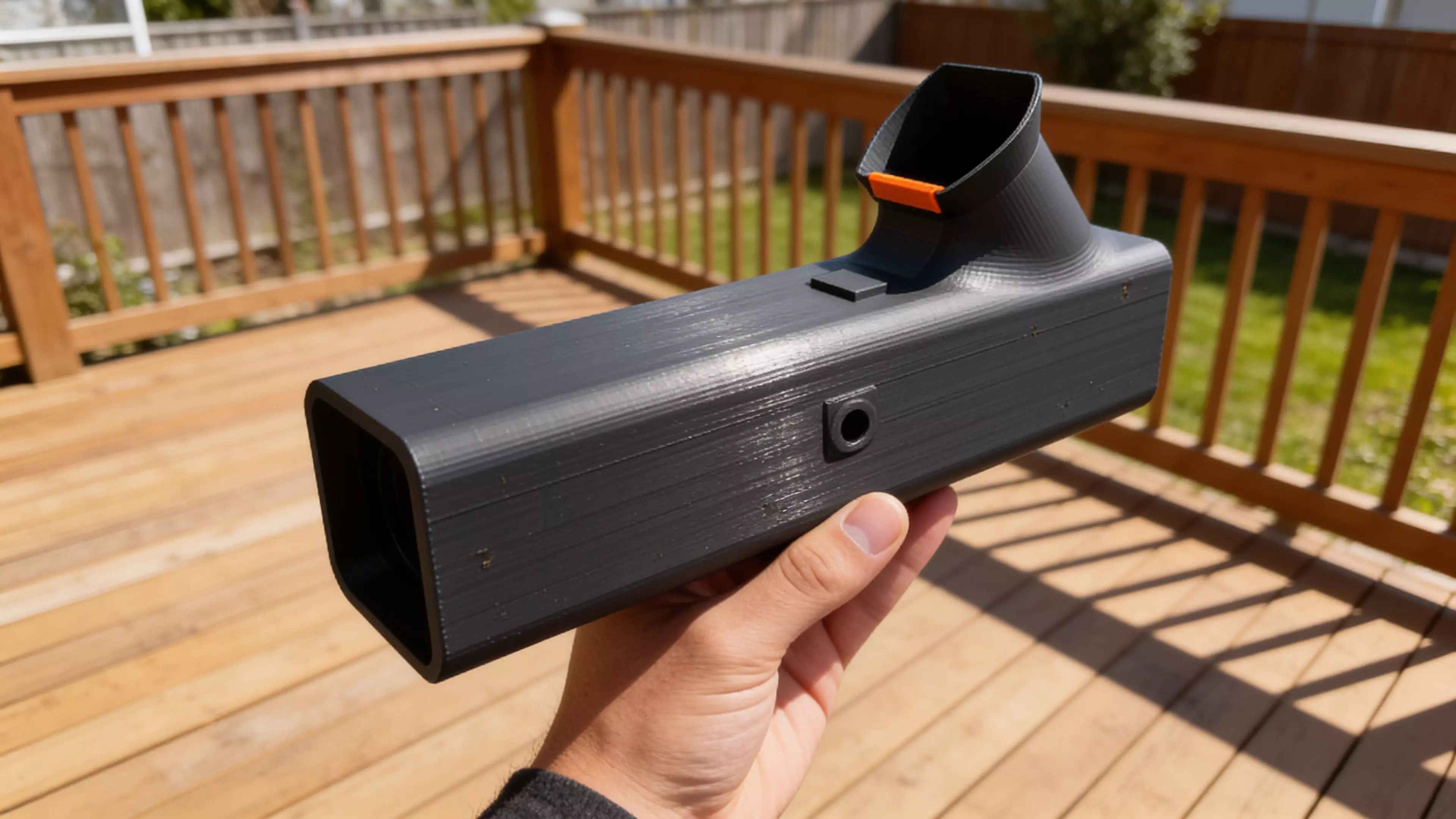 A pocket observatory for eclipse day: point it sunward, shrink the orange tab’s shadow to a dot, and a crisp solar crescent appears on the internal screen — you never look at the sun. Optics-calibrated 0.7 mm pinhole, 55° glare-hooded eyepiece, prints in one piece with zero supports in ~8.5 h. 152 × 38 × 74 mm, PLA.