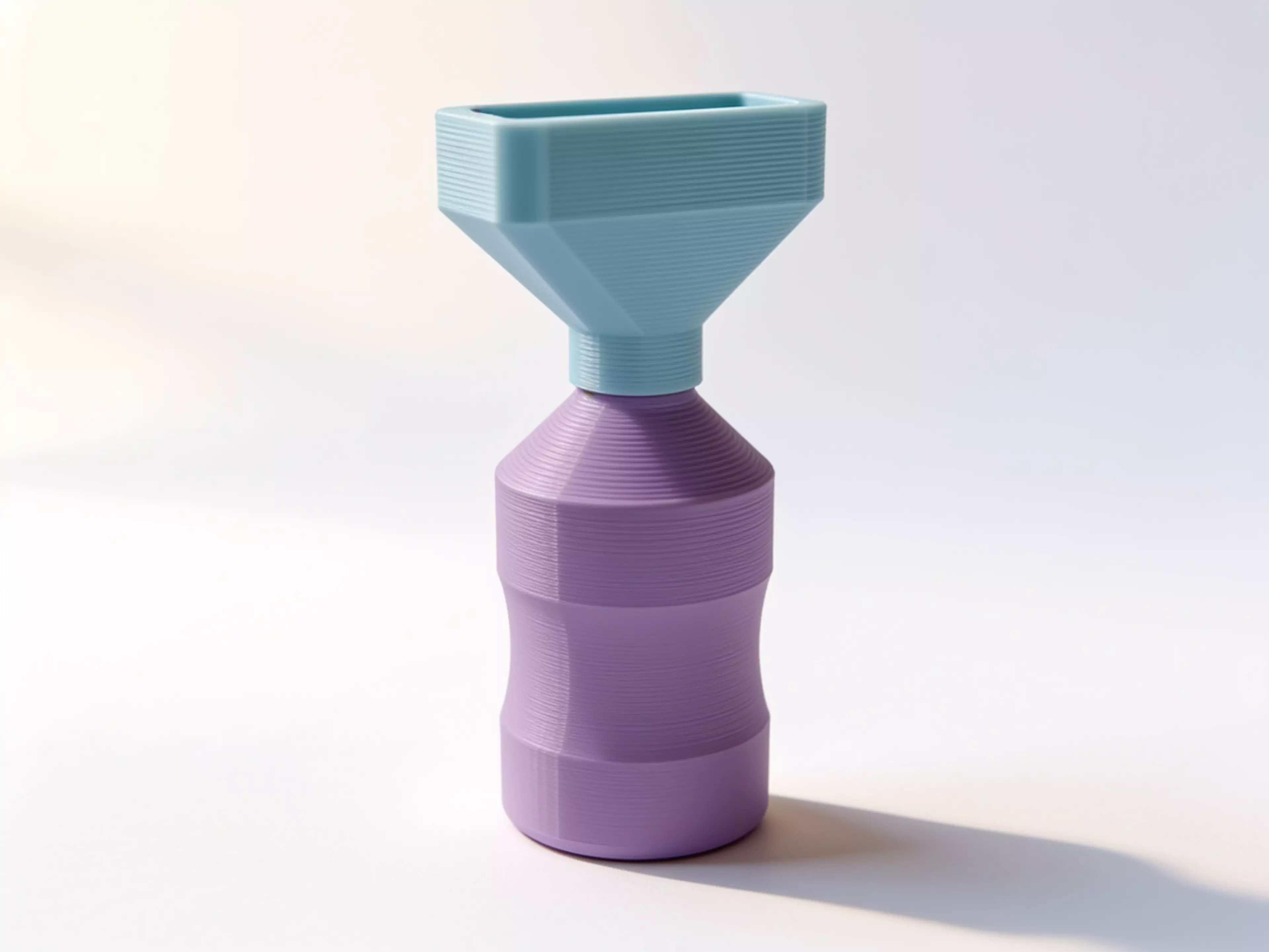Stop juggling your water bottle and phone during workouts.
📱 PHONE STAND CAP
Screw-on lid doubles as a secure phone holder with a self-adjusting wedge slot (fits 70-90mm wide phones with case). Landscape orientation perfect for watching exercise tutorials, timers, or music playlists.

💧 500ML HYDRATION
Generous capacity for full gym sessions. PETG construction is durable, lightweight, and easy to clean. Built-in drainage holes in the phone slot keep moisture away from your device.

🏋️ GYM-READY DESIGN
Stable base prevents tipping even when empty. Compact enough for any bench, desk, or floor mat. The angled phone position keeps your screen visible at eye level without straining your neck.

Perfect for: Home gym enthusiasts, personal trainers, CrossFit athletes, yoga practitioners, anyone who follows video workouts.