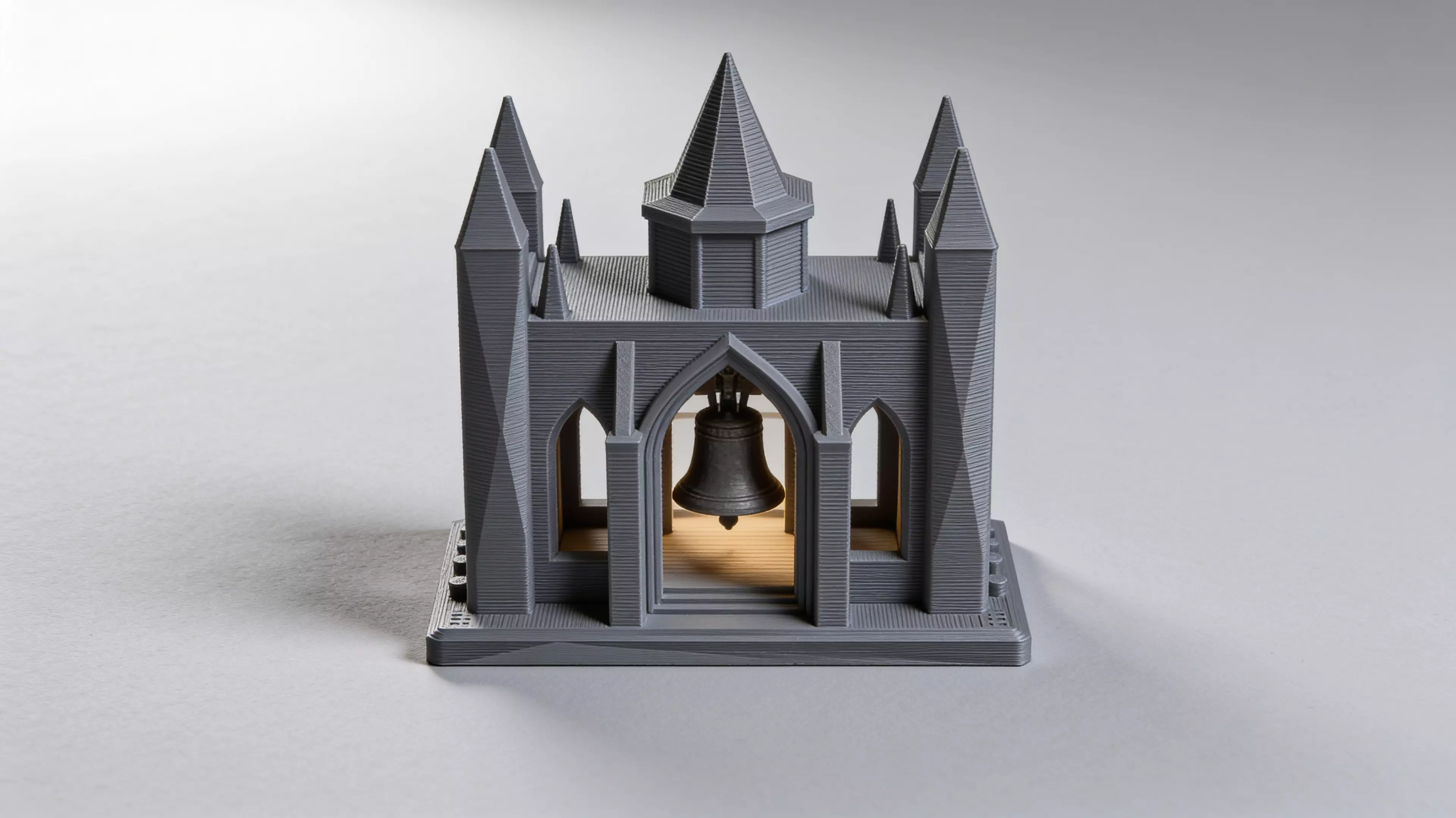 The Calibration Cathedral is a Gothic micro-cathedral that is secretly a complete FDM torture test: self-supporting pointed-arch windows, a graduated flying-buttress overhang staircase, tapered spires and pinnacles for bed adhesion and fine detail, a bridging rose window, a print-in-place captured…